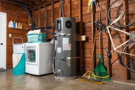 Tank water heater in garage.